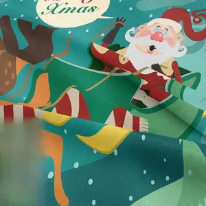 Close-up of soft flannel Christmas tapestry featuring Santa Claus and Xmas lettering