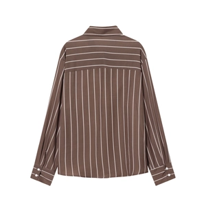 Back view of brown and white striped long sleeve shirt with horizontal yoke detail