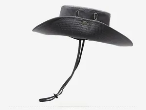 Detail view of dark grey outdoor sun hat with breathable mesh vents and side metal snaps