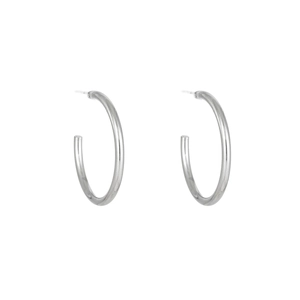 Close-up of minimalist silver stainless steel C-shape hoop earrings on white background