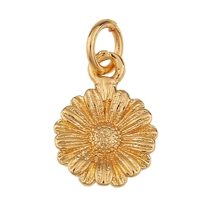 Detailed close-up of a gold daisy flower charm with micro-inlaid petals for jewelry making