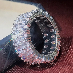 Double row silver ring featuring water drop cubic zirconia in a luxury red velvet box