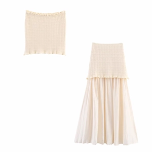 Detail of apricot knitted tube top and pleated patchwork maxi skirt in high quality