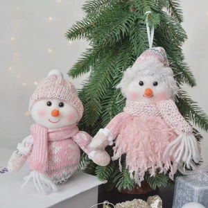 Pink and white plush snowman Christmas ornament with knitted hat for holiday decoration