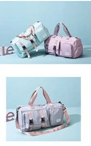 Close-up of waterproof nylon travel bags in blue, purple and grey with multiple compartments