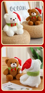 Close-up of plush Christmas teddy bears with red Santa hats and green knitted scarves