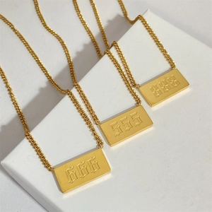 Golden square pendant necklaces featuring 555, 666, and 888 angel numbers on white blocks