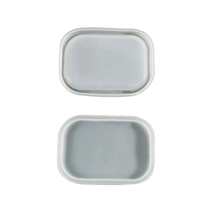 Macro view of grey silicone molds for DIY resin craft oval tray and jewelry storage