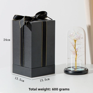Detail view of colorful foil rose in glass dome with gift box and dimensions 24x13.5x13.5cm