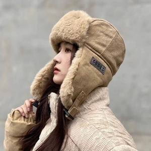Winter khaki trapper hat for women with warm beige fleece lining and adjustable buckle