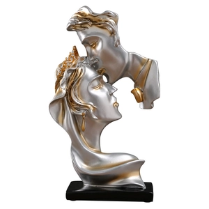 Modern gold and silver kissing couple resin sculpture on black base for home decor