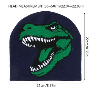 Detailed knit beanie view showing green dinosaur motif and size measurement specs