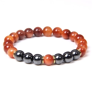 Detailed macro view of 8mm natural tiger eye stone beads and metallic hematite spacers