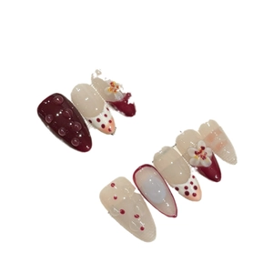 Handmade burgundy and cream floral press-on nails with 3D water drops and embossed flowers