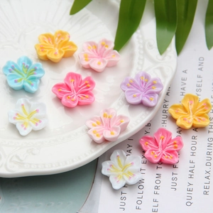 Assorted colorful resin cherry blossom charms for DIY jewelry and phone case making