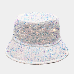 Detailed close-up of white sequin bucket hat with iridescent round scales on a plain surface