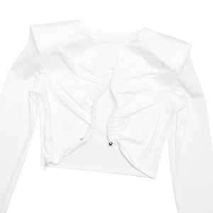Detailed view of the white long sleeve top featuring drawstring design and silver metal buckle