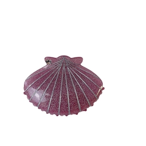 Purple glitter shell hair claw clip with shimmering rhinestones for stylish hair styling