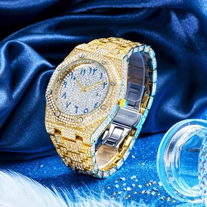 Luxury gold iced-out men's watch with Arabic numerals and date window display