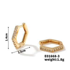 Detail of 1.4cm geometric hexagonal gold hoop earrings with white zircon stones