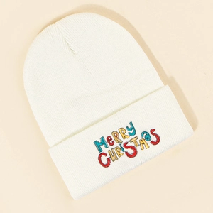 Detailed view of Merry Christmas multi-color embroidery on a white knitted beanie hat