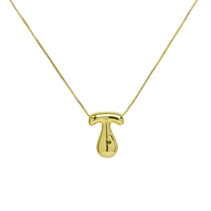 Macro shot of 18K gold plated letter T bubble pendant with polished stainless steel chain