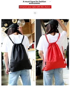 Waterproof nylon drawstring backpack in black and red with honeycomb texture detail