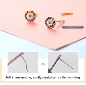 Macro view of S925 silver needle for evil eye stud showing the flexible metal detail