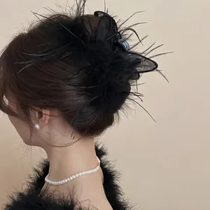 Elegant black feather hair claw clip with mesh bunny ear design for women hair styling