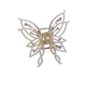 Elegant gold butterfly hair claw clip with pearls and rhinestones on white background