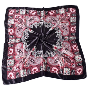 Detail of classic paisley and floral print on large square satin scarf in red and black