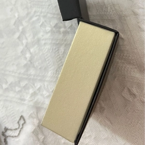 Elegant jewelry gift box set with light yellow textured inner and black flip-top cover