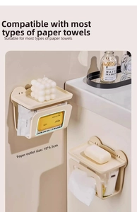 Wall-mounted tissue box holder showing 10x6.5cm opening size for easy extraction
