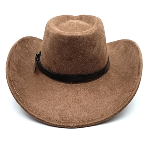 Detail of light brown suede cowboy hat featuring black decorative band and metal buckle