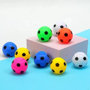 Macro view of colorful mini soccer fidget spinners on geometric display stands