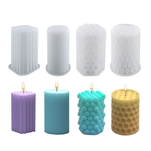 Silicone pillar candle mold set with striped and textured geometric resin designs