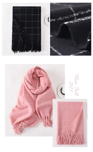 Detail showing pink and black windowpane check scarf with soft texture and fringe edges