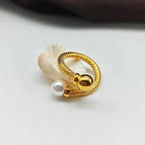 18K gold plated stainless steel cable ring with white pearl and metallic ball design