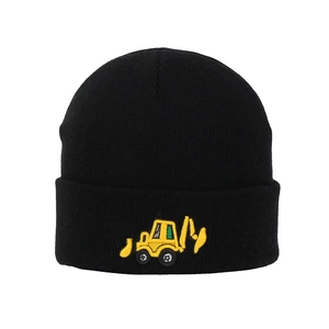 Detailed embroidery of a yellow excavator on a black knitted winter beanie for boys