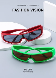 Detail of red and neon green Y2K punk sports sunglasses with UV protection features