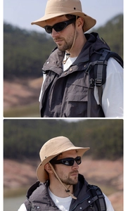 Detail of khaki outdoor sun hat with windproof drawstring and multi-pocket fishing vest