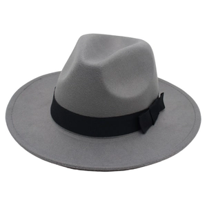 Classic grey wool fedora hat with black ribbon band and bow decoration on white background