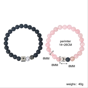 Luminous sun and moon beaded couple bracelets with matte black and pink gemstone beads
