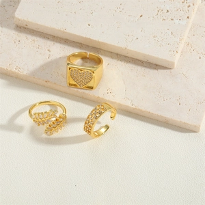 Three-piece 14K gold plated ring set featuring zircon star and heart shapes on stone base