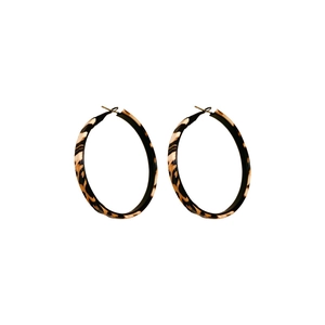 Exaggerated leopard print leather hoop earrings with sterling silver needles on white background