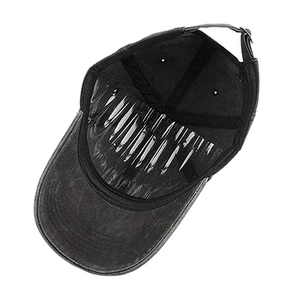 Internal view of washed cotton baseball cap showing sweatband and adjustable metal strap