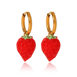 Detailed view of red resin strawberry pendants on gold stainless steel hoop earrings