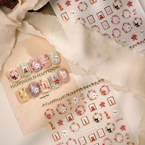 Cute gold-stamped garden animal nail stickers with rabbit, dog and floral motifs