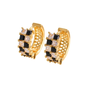 Golden hoop earrings with black and white zircon checkerboard pattern on white background