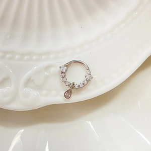 Silver stainless steel nose ring with sparkling zircons and a teardrop pendant